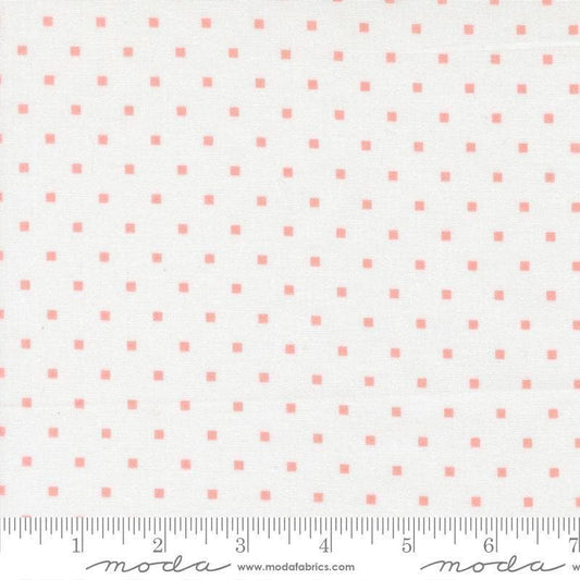 Image of A Cat Named Stitch Cosmo Cream Blush quilting cotton fabric by Camille Roskelley for Riley Blake Designs. Features polka dot square on a cream background. Cute Little Fabric Shop.