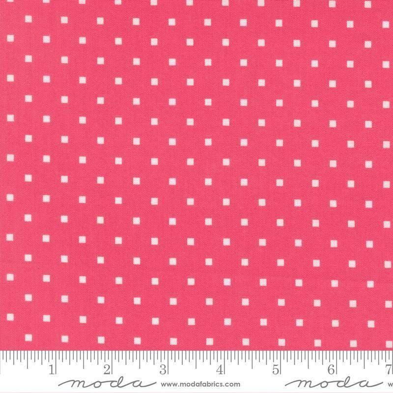Image of A Cat Named Stitch Cosmo Rosie quilting cotton fabric by Camille Roskelley for Riley Blake Designs. Features polka dot squares on a pink background. Cute Little Fabric Shop.