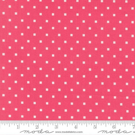 Image of A Cat Named Stitch Cosmo Rosie quilting cotton fabric by Camille Roskelley for Riley Blake Designs. Features polka dot squares on a pink background. Cute Little Fabric Shop.