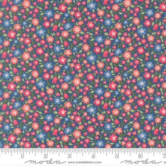 Image of A Cat Named Stitch Lucky Sea quilting cotton fabric by Camille Roskelley for Riley Blake Designs. Features flowers on a blue background. Cute Little Fabric Shop.