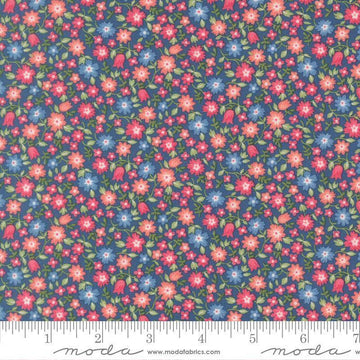 Image of A Cat Named Stitch Lucky Sea quilting cotton fabric by Camille Roskelley for Riley Blake Designs. Features flowers on a blue background. Cute Little Fabric Shop.