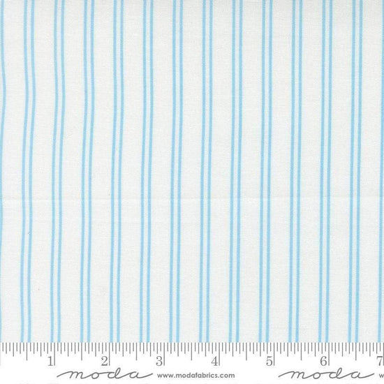 Image of A Cat Named Stitch Stripes Cream Sky quilting cotton fabric by Camille Roskelley for Riley Blake Designs. Features stripes on a cream background. Cute Little Fabric Shop.