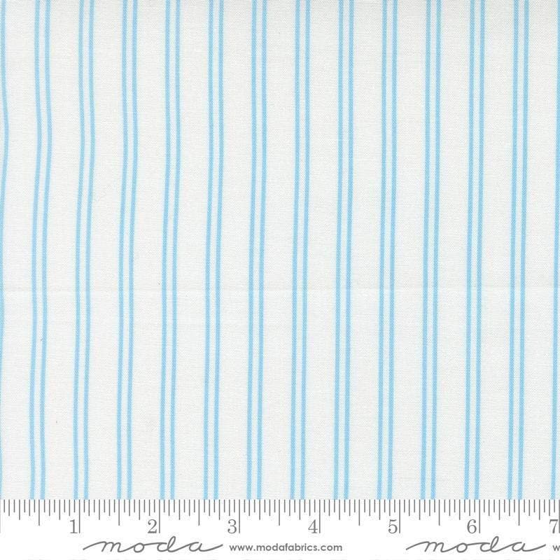 Image of A Cat Named Stitch Stripes Cream Sky quilting cotton fabric by Camille Roskelley for Riley Blake Designs. Features stripes on a cream background. Cute Little Fabric Shop.