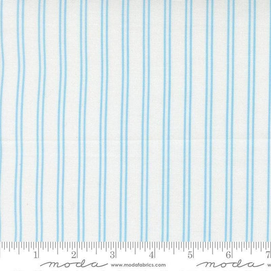 Image of A Cat Named Stitch Stripes Cream Sky quilting cotton fabric by Camille Roskelley for Riley Blake Designs. Features stripes on a cream background. Cute Little Fabric Shop.