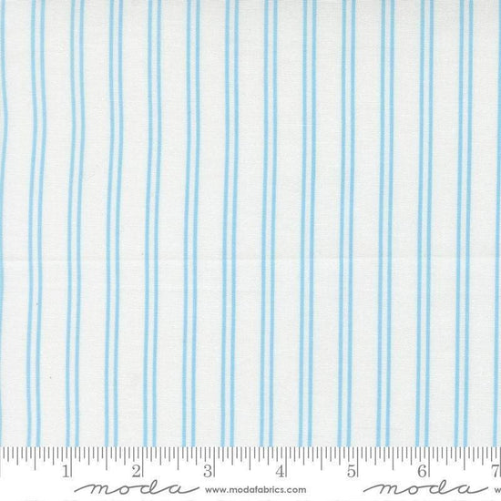 Image of A Cat Named Stitch Stripes Cream Sky quilting cotton fabric by Camille Roskelley for Riley Blake Designs. Features stripes on a cream background. Cute Little Fabric Shop.