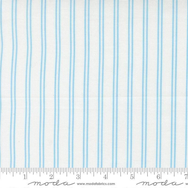 Image of A Cat Named Stitch Stripes Cream Sky quilting cotton fabric by Camille Roskelley for Riley Blake Designs. Features stripes on a cream background. Cute Little Fabric Shop.