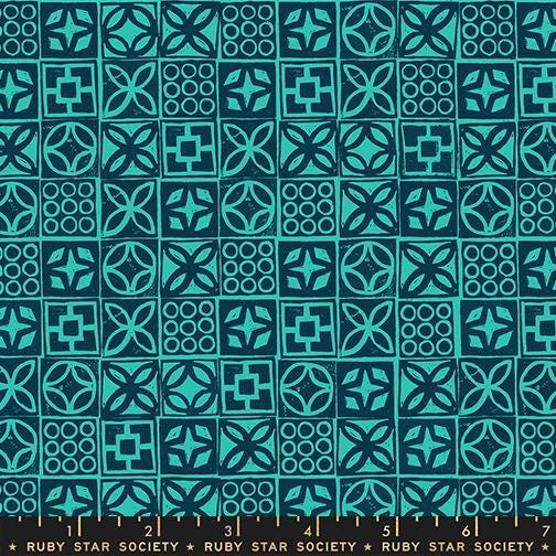 Image of Poolside Too Architectural Peacock quilting cotton fabric by Ruby Star Society for Moda Fabrics. Features a geometric pattern on a blue background. Cute Little Fabric Shop.