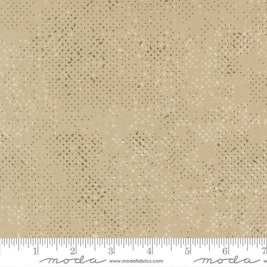 Image of Mira Spotted Tan quilting cotton fabric by Zen Chic for Moda Fabrics. Features printed texture on a brown background. Cute Little Fabric Shop.