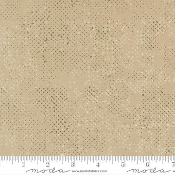 Image of Mira Spotted Tan quilting cotton fabric by Zen Chic for Moda Fabrics. Features printed texture on a brown background. Cute Little Fabric Shop.