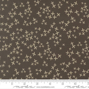 Image of Mira Realm Charcoal quilting cotton fabric by Zen Chic for Moda Fabrics. Features crosses on a brown background. Cute Little Fabric Shop.