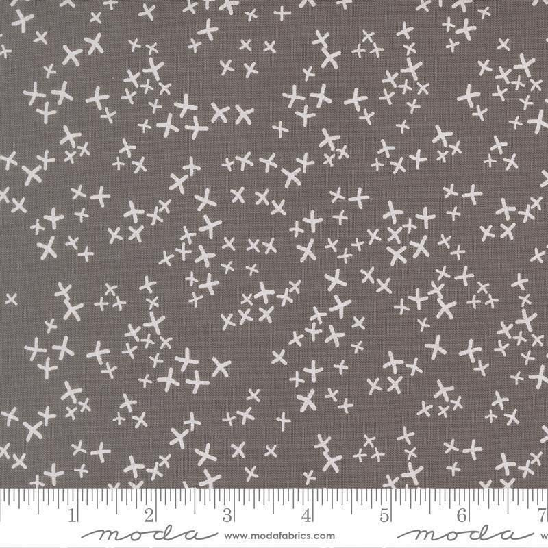 Image of Mira Realm Graphite quilting cotton fabric by Zen Chic for Moda Fabrics. Features crosses on a gray background. Cute Little Fabric Shop.
