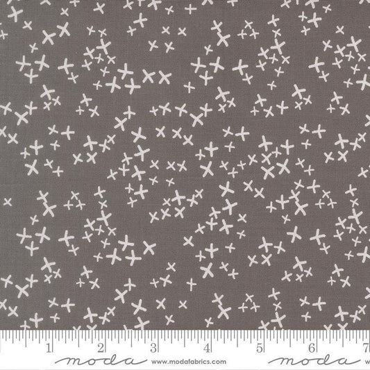 Image of Mira Realm Graphite quilting cotton fabric by Zen Chic for Moda Fabrics. Features crosses on a gray background. Cute Little Fabric Shop.