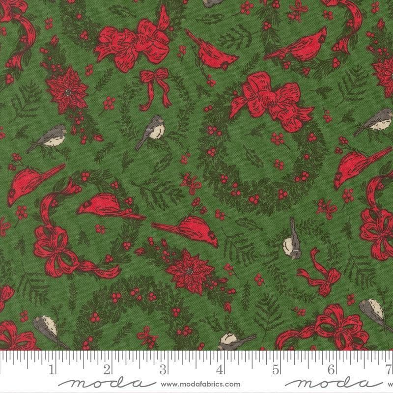 Image of Holiday Cheer Deck the Halls Evergreen quilting cotton fabric by Stacy Iest Hsu for Moda Fabrics. Features wreaths on a green background. Cute Little Fabric Shop.