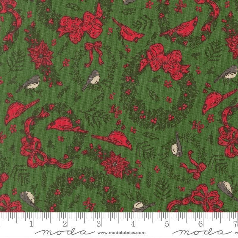 Image of Holiday Cheer Deck the Halls Evergreen quilting cotton fabric by Stacy Iest Hsu for Moda Fabrics. Features wreaths on a green background. Cute Little Fabric Shop.
