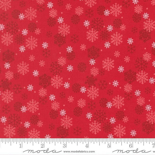 Image of Holiday Cheer Snowflake Poinsettia quilting cotton fabric by Stacy Iest Hsu for Moda Fabrics. Features snowflakes on a red background. Cute Little Fabric Shop.
