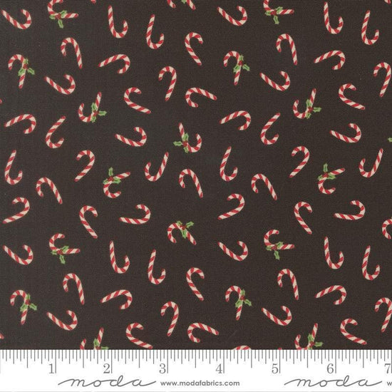 Image of Holiday Cheer Candy Cane Midnight quilting cotton fabric by Stacy Iest Hsu for Moda Fabrics. Features Candy Cane on a black background. Cute Little Fabric Shop.