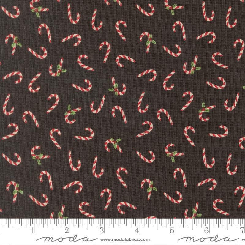 Image of Holiday Cheer Candy Cane Midnight quilting cotton fabric by Stacy Iest Hsu for Moda Fabrics. Features Candy Cane on a black background. Cute Little Fabric Shop.