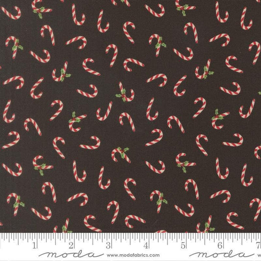Image of Holiday Cheer Candy Cane Midnight quilting cotton fabric by Stacy Iest Hsu for Moda Fabrics. Features Candy Cane on a black background. Cute Little Fabric Shop.