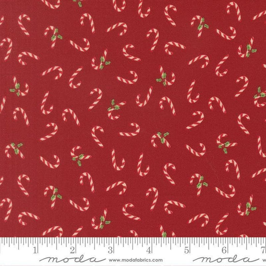 Image of Holiday Cheer Candy Cane Cardinal quilting cotton fabric by Stacy Iest Hsu for Moda Fabrics. Features candy canes on a red background. Cute Little Fabric Shop.