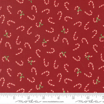 Image of Holiday Cheer Candy Cane Cardinal quilting cotton fabric by Stacy Iest Hsu for Moda Fabrics. Features candy canes on a red background. Cute Little Fabric Shop.