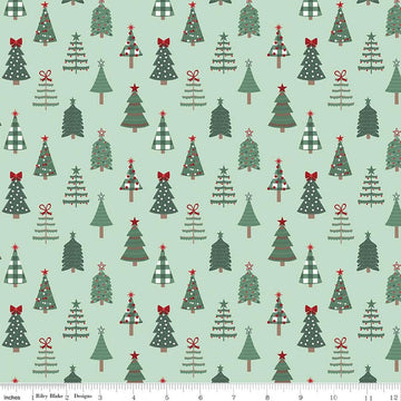 Image of Evergreen Wishes Trees Mint quilting cotton fabric by Traci Reed for Riley Blake Designs. Features trees on a green background. Cute Little Fabric Shop.