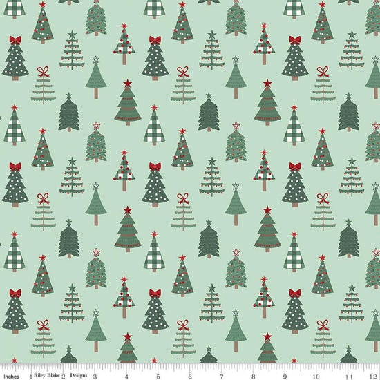 Image of Evergreen Wishes Trees Mint quilting cotton fabric by Traci Reed for Riley Blake Designs. Features trees on a green background. Cute Little Fabric Shop.