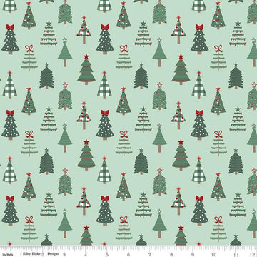 Image of Evergreen Wishes Trees Mint quilting cotton fabric by Traci Reed for Riley Blake Designs. Features trees on a green background. Cute Little Fabric Shop.