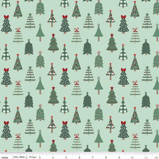 Image of Evergreen Wishes Trees Mint quilting cotton fabric by Traci Reed for Riley Blake Designs. Features trees on a green background. Cute Little Fabric Shop.
