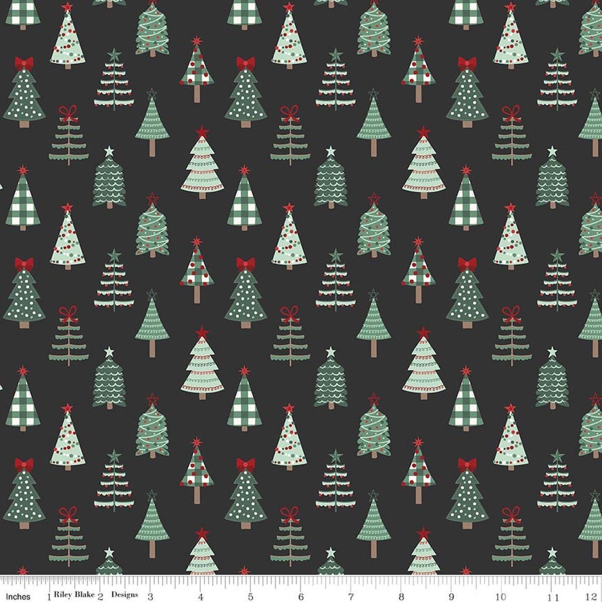 Image of Evergreen Wishes Trees Black quilting cotton fabric by Traci Reed for Riley Blake Designs. Features trees on a black background. Cute Little Fabric Shop.