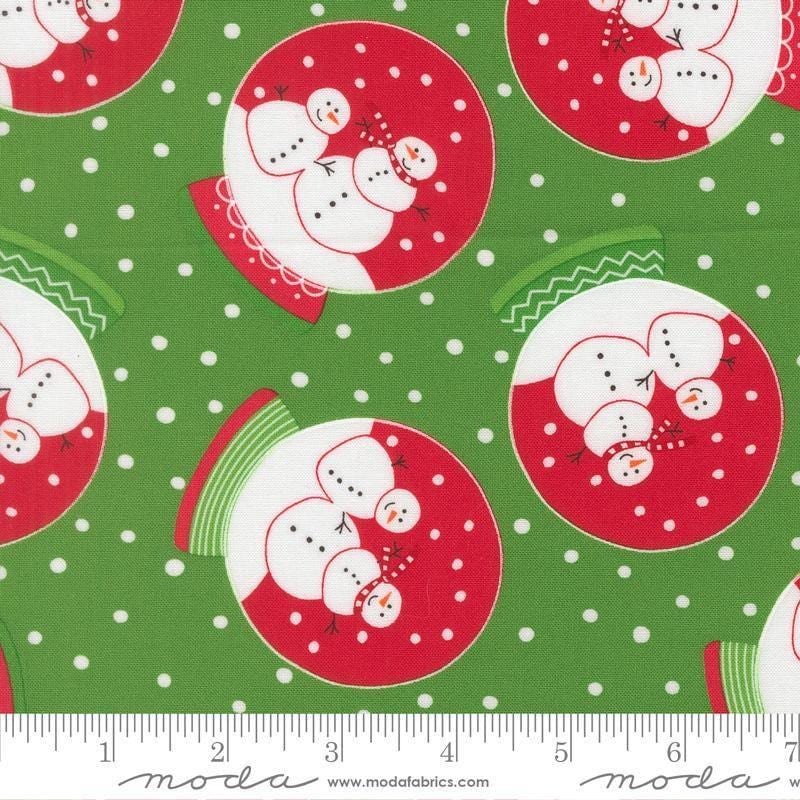 Image of Snow Time Globe Evergreen quilting cotton fabric by Me and My Sister Designs for Moda Fabrics. Features snowglobes on a green background. Cute Little Fabric Shop.