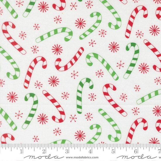 Image of Snow Time Candy Cane Winter White quilting cotton fabric by Me and My Sister Designs for Moda Fabrics. Features candy canes on a white background. Cute Little Fabric Shop.