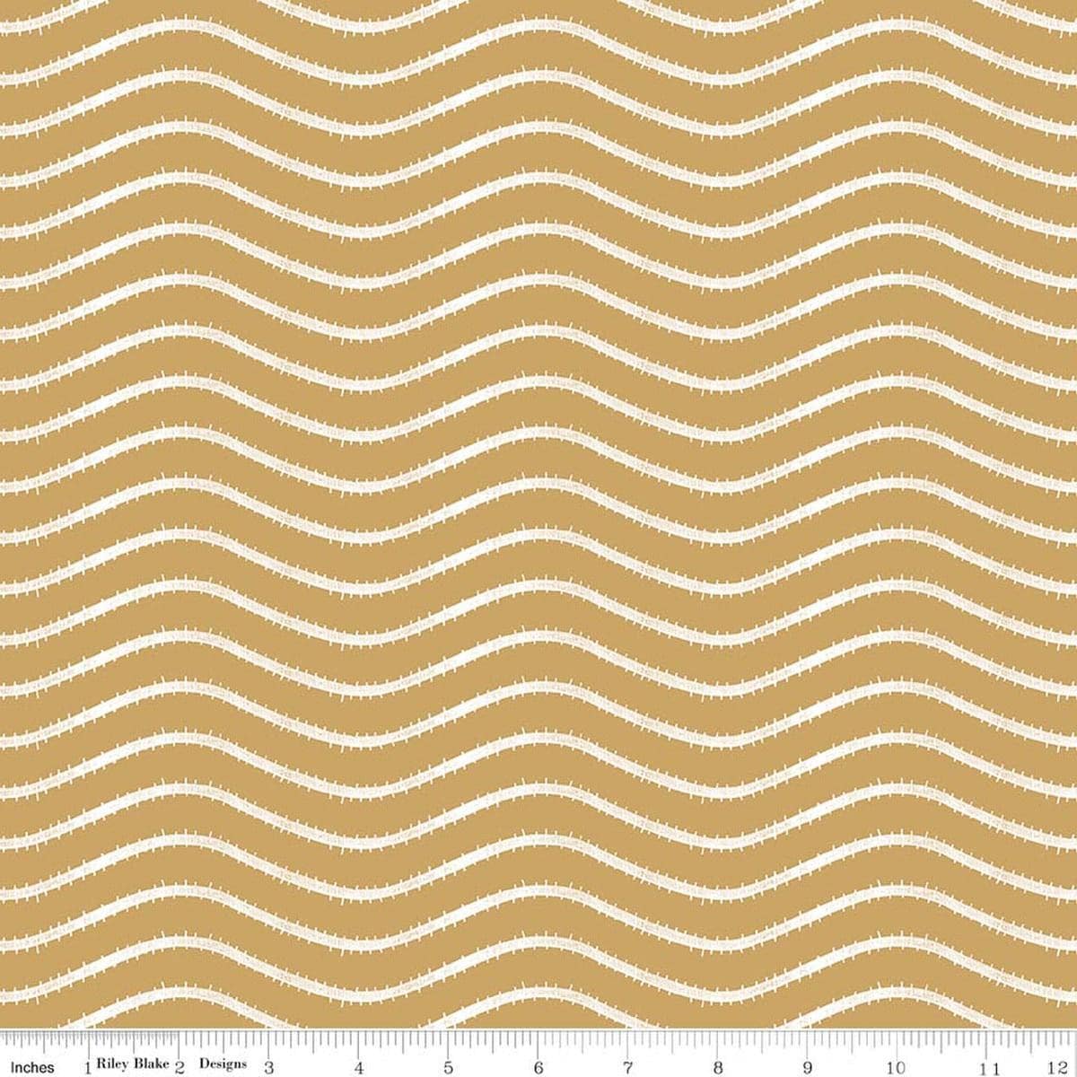 Image of Gingerbread Icing Stripe Gingersnap quilting cotton fabric by J. Wecker Frisch for Riley Blake Designs. Features wavy stripes on a brown background. Cute Little Fabric Shop.