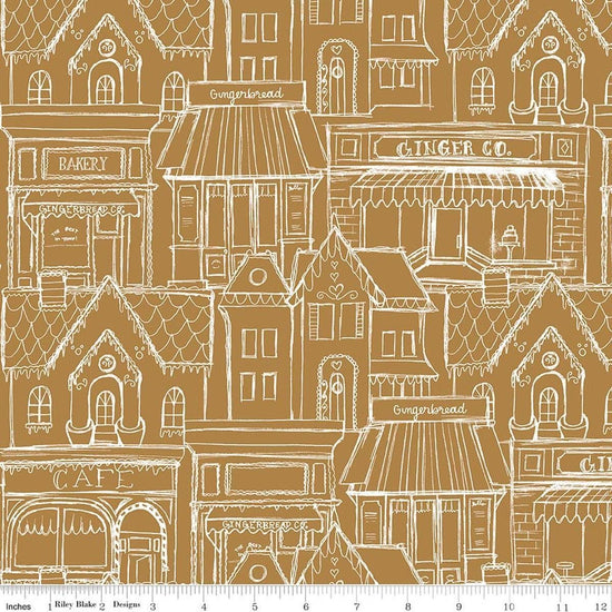 Image of Gingerbread Village Gingersnap quilting cotton fabric by J. Wecker Frisch for Riley Blake Designs. Features buildings on a brown background. Cute Little Fabric Shop.