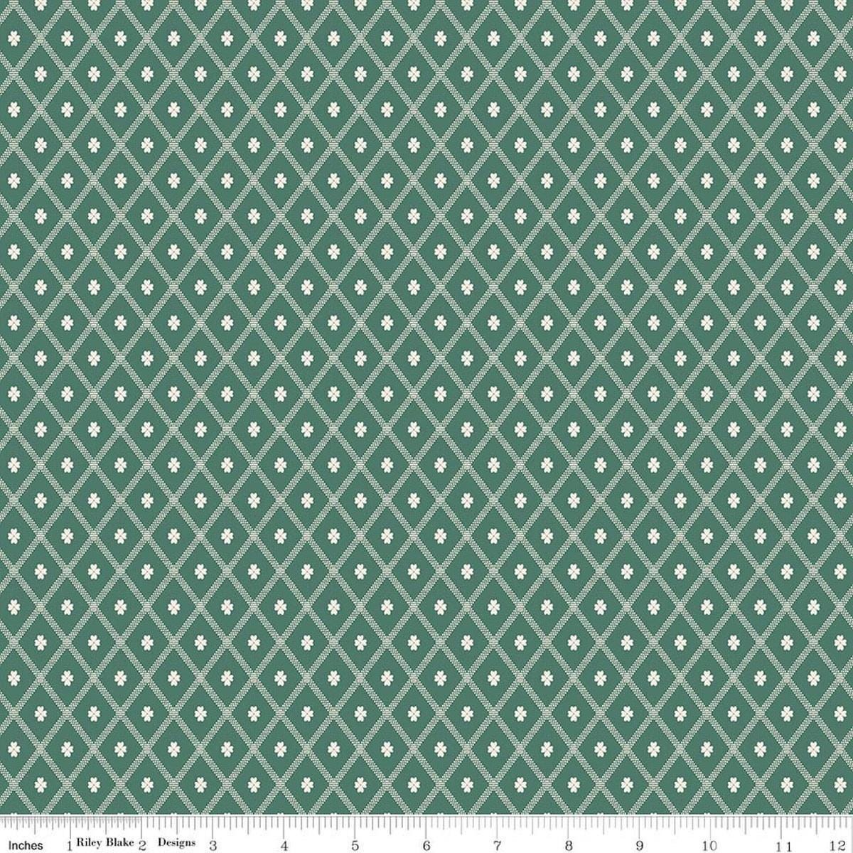Image of Northanger Abbey Thorpe Green quilting cotton fabric by Official Licensed Product for Riley Blake Designs. Features diamonds on a green background. Cute Little Fabric Shop.