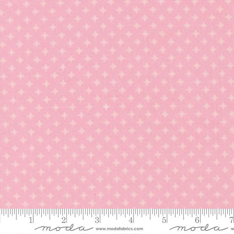 Image of Scenery Diamonds Blush quilting cotton fabric by Elizabeth Hartman for Moda Fabrics. Features a geometric pattern on a pink background. Cute Little Fabric Shop.