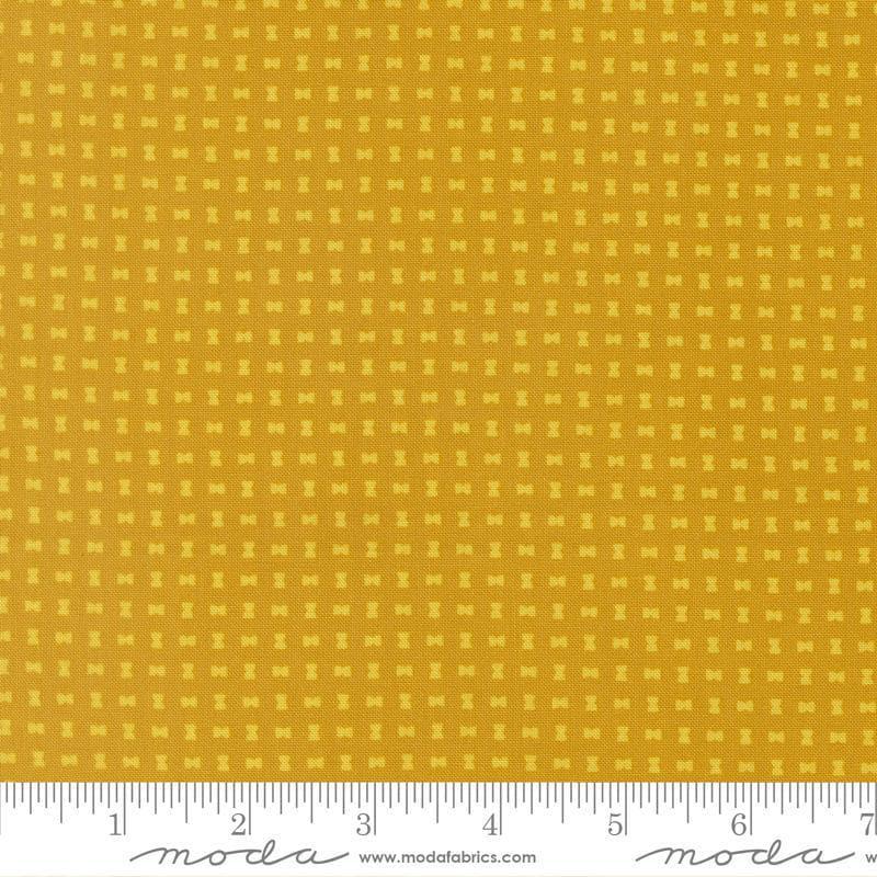 Image of Scenery Spool Golden quilting cotton fabric by Elizabeth Hartman for Moda Fabrics. Features a geometric pattern on a yellow background. Cute Little Fabric Shop.