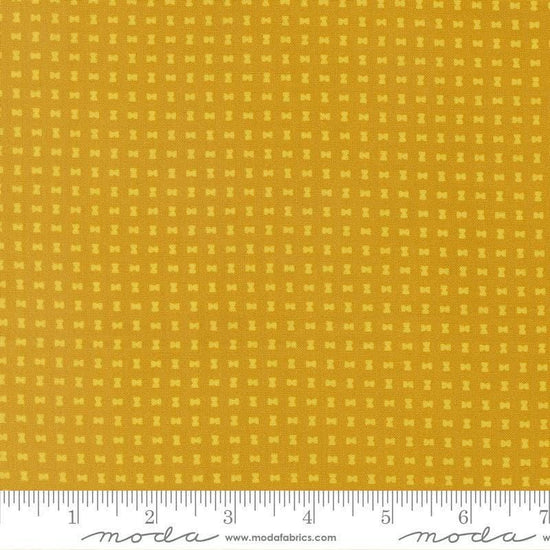 Image of Scenery Spool Golden quilting cotton fabric by Elizabeth Hartman for Moda Fabrics. Features a geometric pattern on a yellow background. Cute Little Fabric Shop.