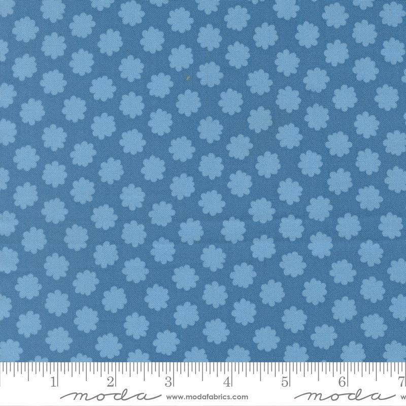Image of Scenery Puffball Coastal quilting cotton fabric by Elizabeth Hartman for Moda Fabrics. Features a geometric pattern on a blue background. Cute Little Fabric Shop.