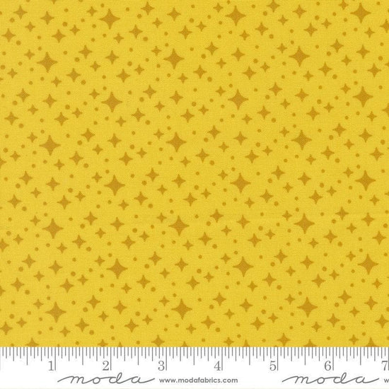 Image of Scenery Starlight Citrine quilting cotton fabric by Elizabeth Hartman for Moda Fabrics. Features stars on a yellow background. Cute Little Fabric Shop.