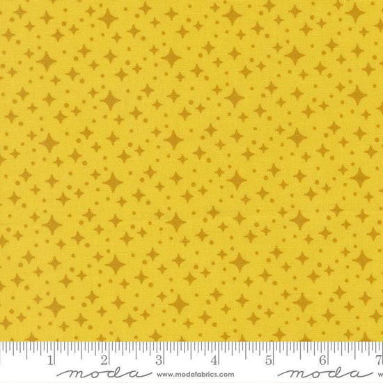 Image of Scenery Starlight Citrine quilting cotton fabric by Elizabeth Hartman for Moda Fabrics. Features stars on a yellow background. Cute Little Fabric Shop.