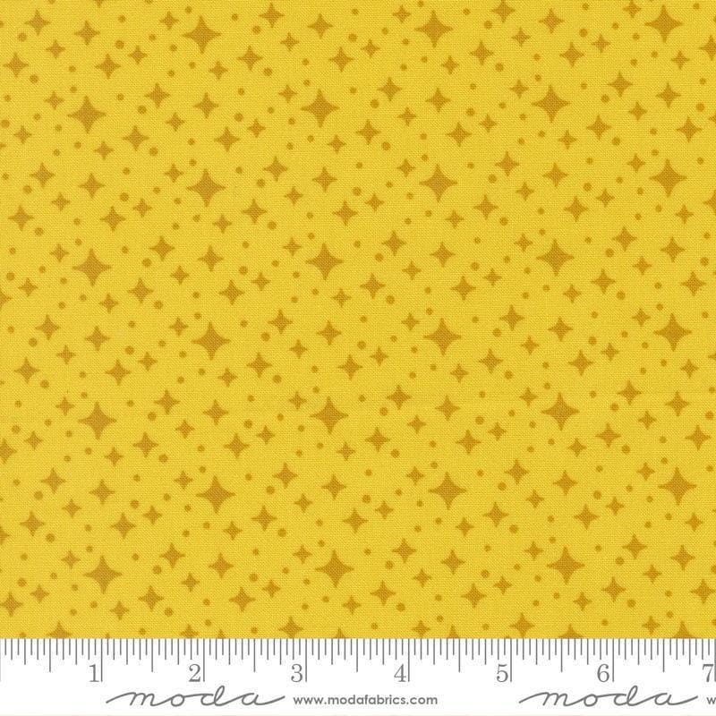 Image of Scenery Starlight Citrine quilting cotton fabric by Elizabeth Hartman for Moda Fabrics. Features stars on a yellow background. Cute Little Fabric Shop.
