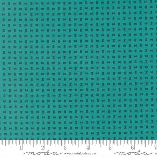 Image of Scenery Spool Turquoise quilting cotton fabric by Elizabeth Hartman for Moda Fabrics. Features a geometric pattern on a blue background. Cute Little Fabric Shop.