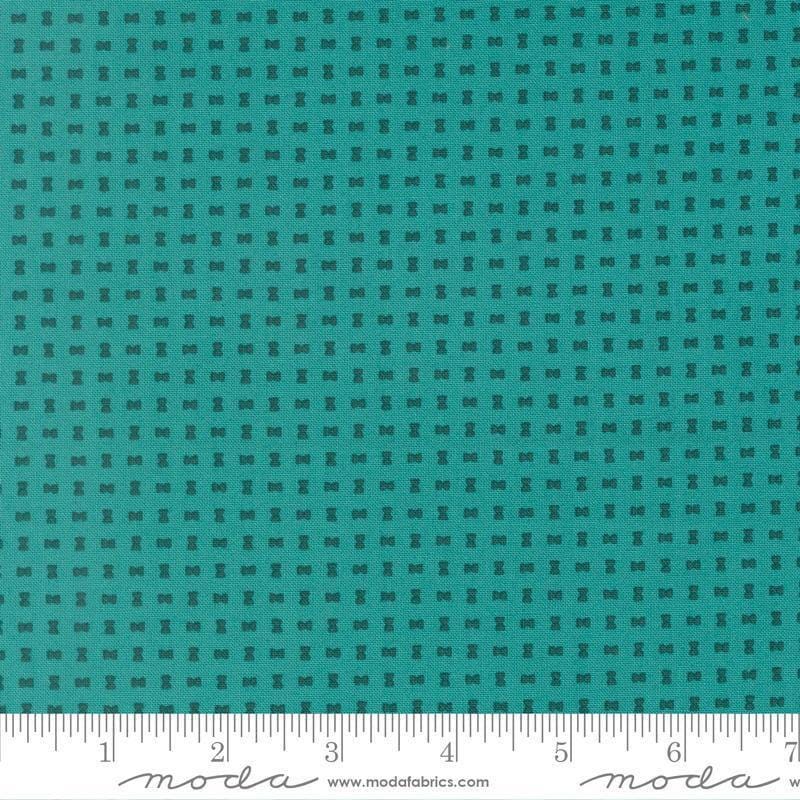 Image of Scenery Spool Turquoise quilting cotton fabric by Elizabeth Hartman for Moda Fabrics. Features a geometric pattern on a blue background. Cute Little Fabric Shop.