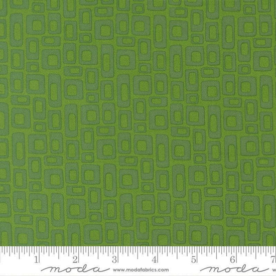 Image of Scenery Marshmallow Evergreen quilting cotton fabric by Elizabeth Hartman for Moda Fabrics. Features a geometric pattern on a green background. Cute Little Fabric Shop.