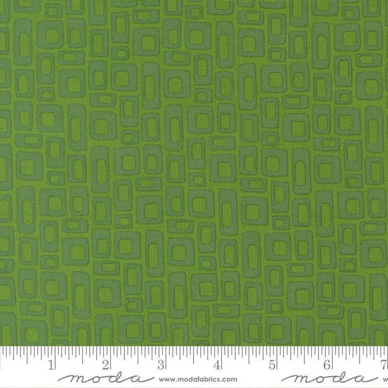 Image of Scenery Marshmallow Evergreen quilting cotton fabric by Elizabeth Hartman for Moda Fabrics. Features a geometric pattern on a green background. Cute Little Fabric Shop.
