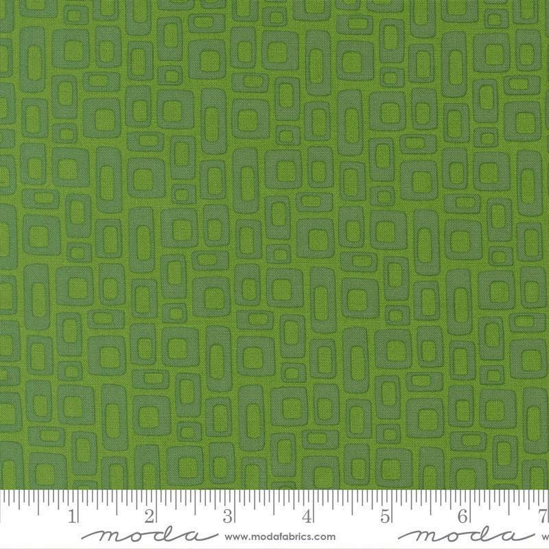 Image of Scenery Marshmallow Evergreen quilting cotton fabric by Elizabeth Hartman for Moda Fabrics. Features a geometric pattern on a green background. Cute Little Fabric Shop.