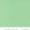Image of Scenery Spools Aqua quilting cotton fabric by Elizabeth Hartman for Moda Fabrics. Features a geometric pattern on a green background. Cute Little Fabric Shop.