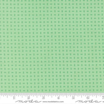 Image of Scenery Spools Aqua quilting cotton fabric by Elizabeth Hartman for Moda Fabrics. Features a geometric pattern on a green background. Cute Little Fabric Shop.