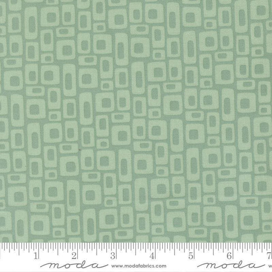 Image of Scenery Marshmallow Dusty Jade quilting cotton fabric by Elizabeth Hartman for Moda Fabrics. Features a geometric pattern on green background. Cute Little Fabric Shop.