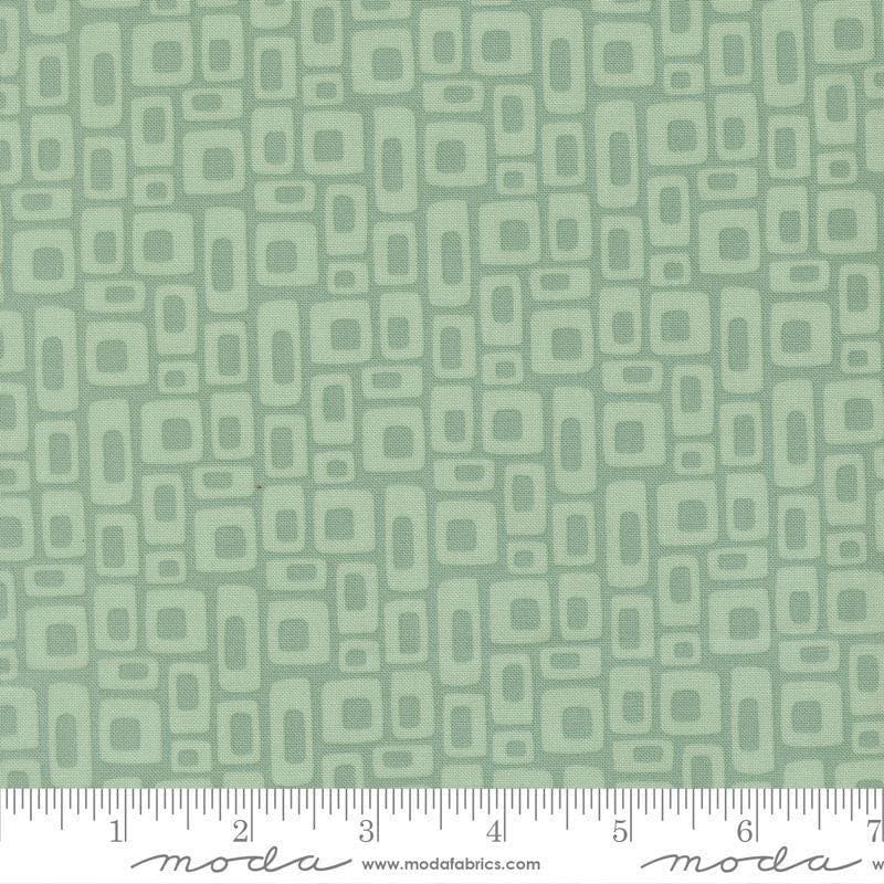 Image of Scenery Marshmallow Dusty Jade quilting cotton fabric by Elizabeth Hartman for Moda Fabrics. Features a geometric pattern on green background. Cute Little Fabric Shop.